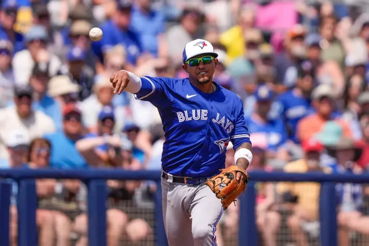 Eduardo Escobar throwing in warmups before Blue Jays game.