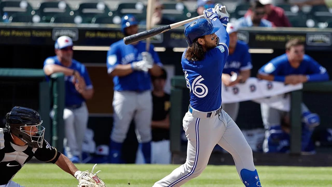 Bo Bichette hits the ball at Spring Training