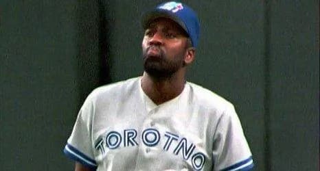 Joe Carter Wearing a Blue Jays jersey that misspelled Toronto
