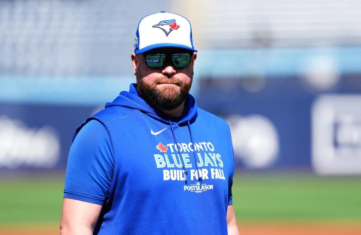 Toronto Blue Jays manager John Schneider (14) before game one against the New York Yankees in the ALDS round for the 2025 MLB playoffs at Rogers Centre.