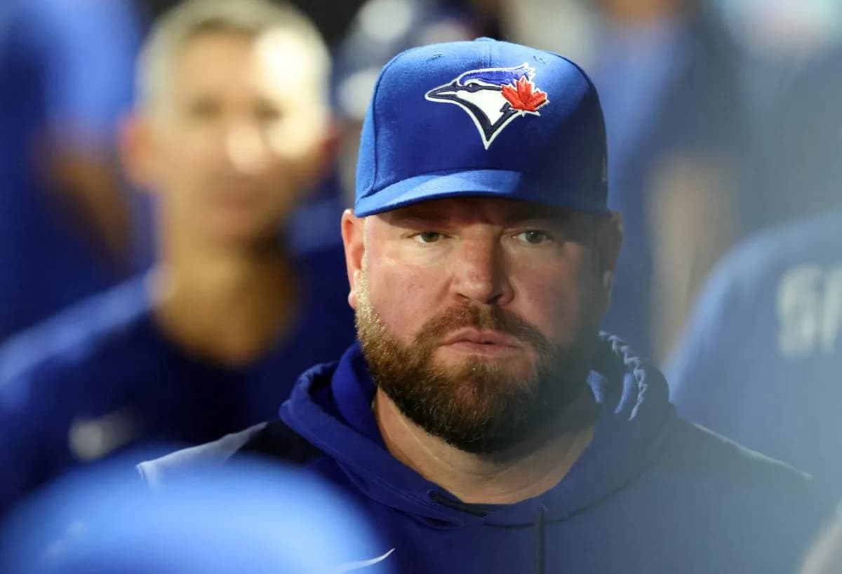Toronto Blue Jays manager John Schneider (14) looks on during the second inning ]against the Tampa Bay Rays at George M. Steinbrenner Field.