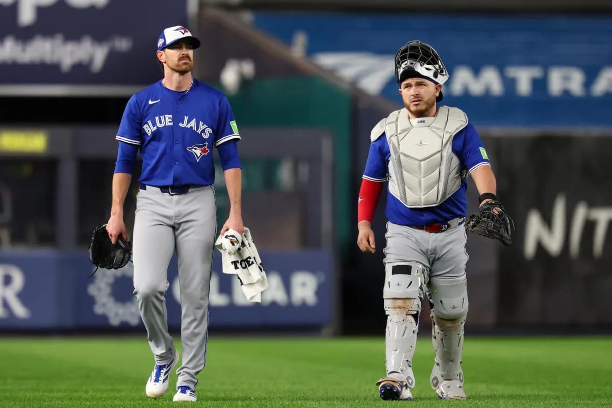 Toronto Blue Jays starting pitcher Shane Bieber (57) and catcher Alejandro Kirk (30) walks to the dugout prior to the game against the New York Yankees during game three of the ALDS round for the 2025 MLB playoffs at Yankee Stadium.