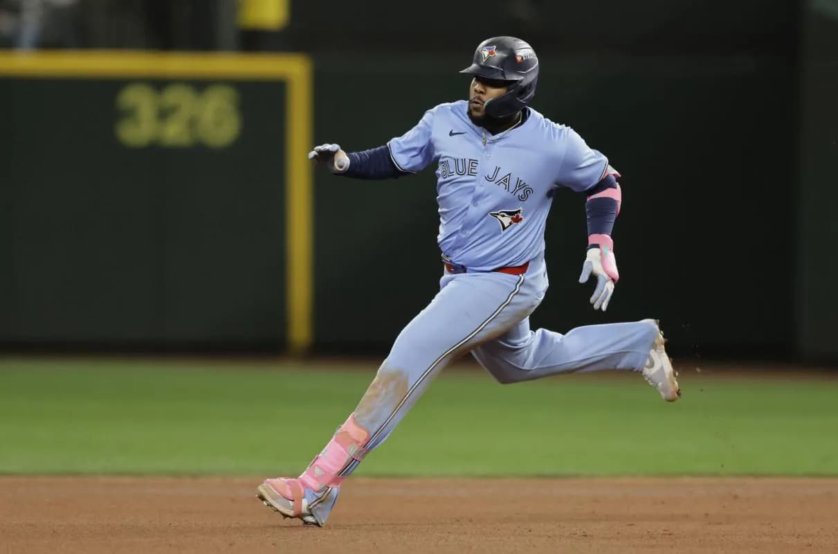 Toronto Blue Jays first baseman Vladimir Guerrero Jr. (27) doubles in the eighth inning against the Seattle Mariners during game three of the ALCS round for the 2025 MLB playoffs at T-Mobile Park.