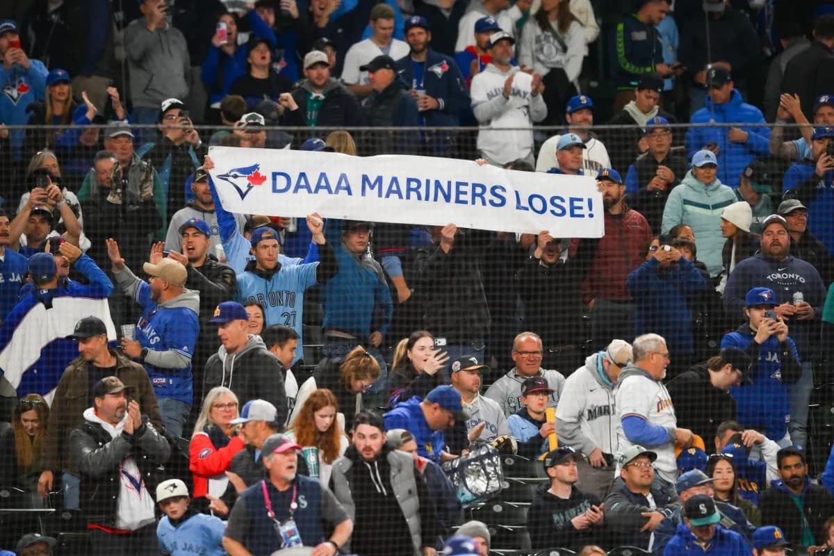 Toronto Blue Jays fans celebrate after the game against the Seattle Mariners during game three of the ALCS round for the 2025 MLB playoffs at T-Mobile Park.