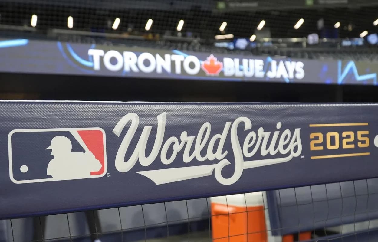 Signage in place on the dug out before game one of the World Series between the Los Angeles Dodgers and Toronto Blue Jays at Rogers Centre.