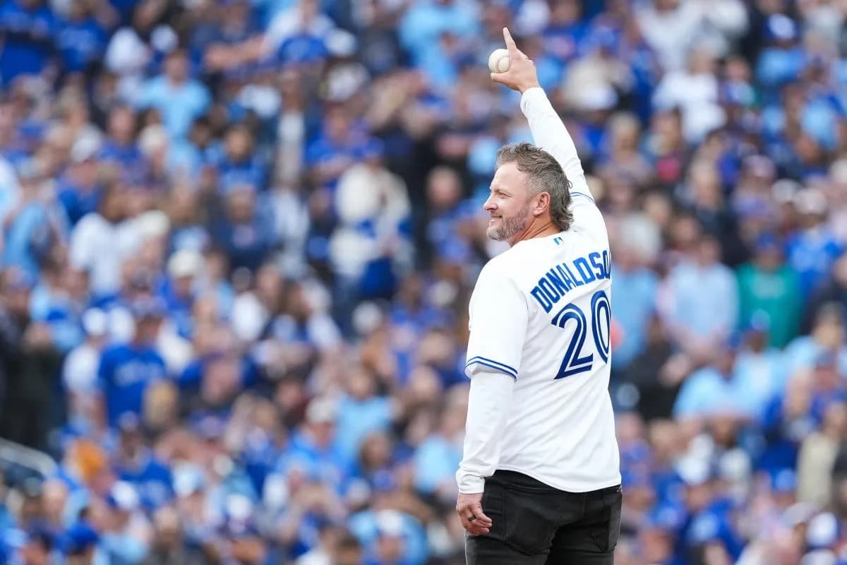 Former Toronto Blue Jays Josh Donaldson throws the first pitch before the game between the Toronto Blue Jays and Seattle Mariners during game two of the ALCS round for the 2025 MLB playoffs at Rogers Centre.