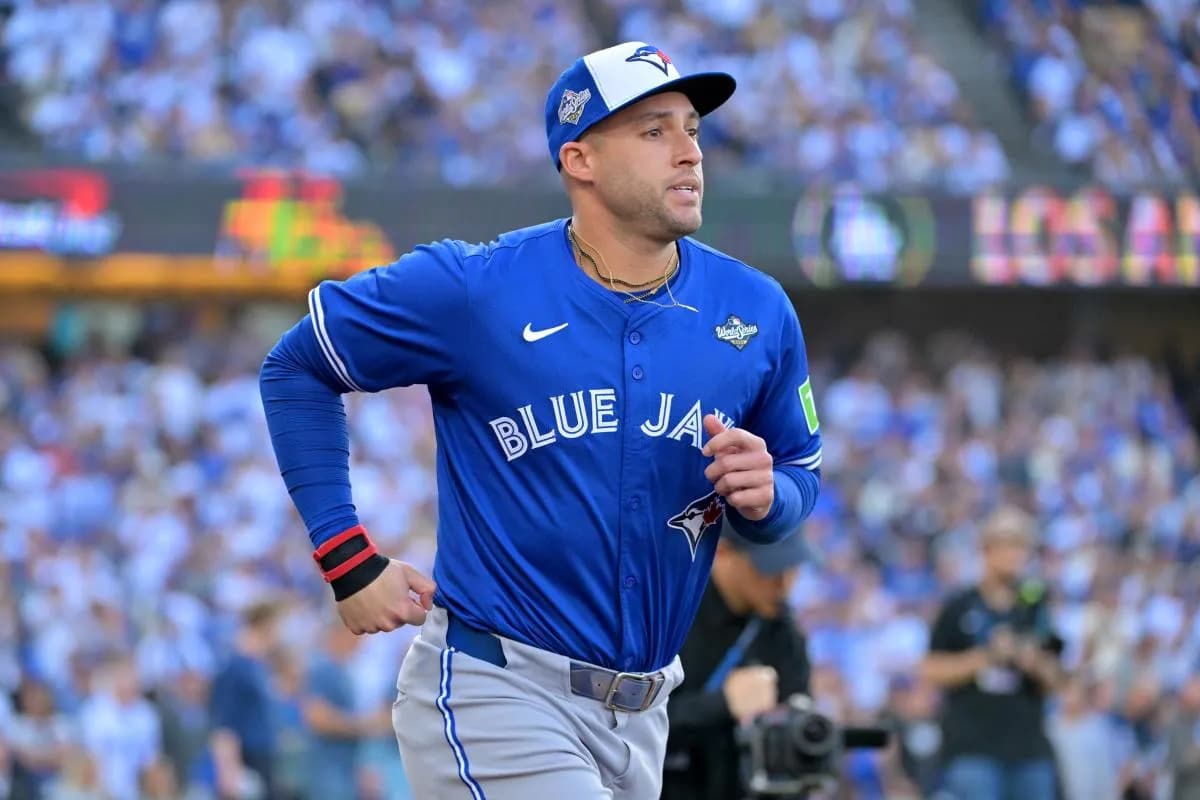 Toronto Blue Jays right fielder George Springer (4) is introduced before game three of the 2025 MLB World Series against the Los Angeles Dodgers at Dodger Stadium.