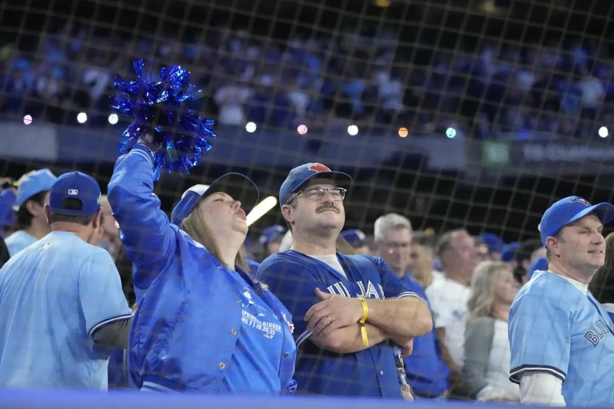 Fans cheer in the eighth inning between the Toronto Blue Jays and the Los Angeles Dodgers during game seven of the 2025 MLB World Series at Rogers Centre.
