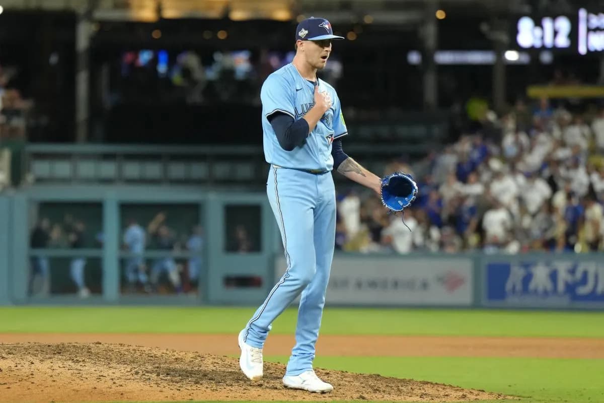 Toronto Blue Jays pitcher Jeff Hoffman (23) reacts after pitching against the Los Angeles Dodgers in the ninth inning during game five of the 2025 MLB World Series at Dodger Stadium.