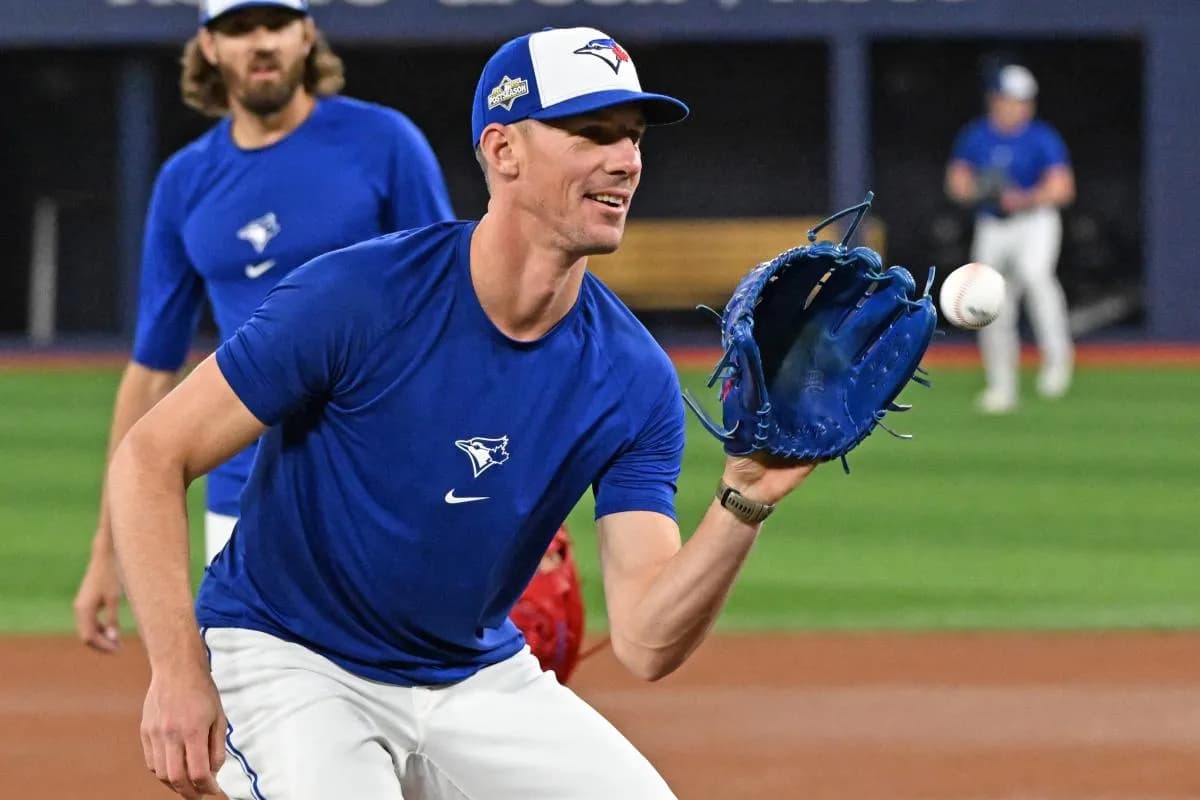 Toronto Blue Jays pitcher Chris Bassitt (40) fields the ball during workouts for the American League Championship Series at Rogers Centre.