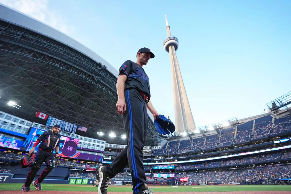 Toronto Blue Jays starting pitcher Chris Bassitt (40) walks towards the dugout before the start of game against the Baltimore Orioles during the first inning at Rogers Centre.