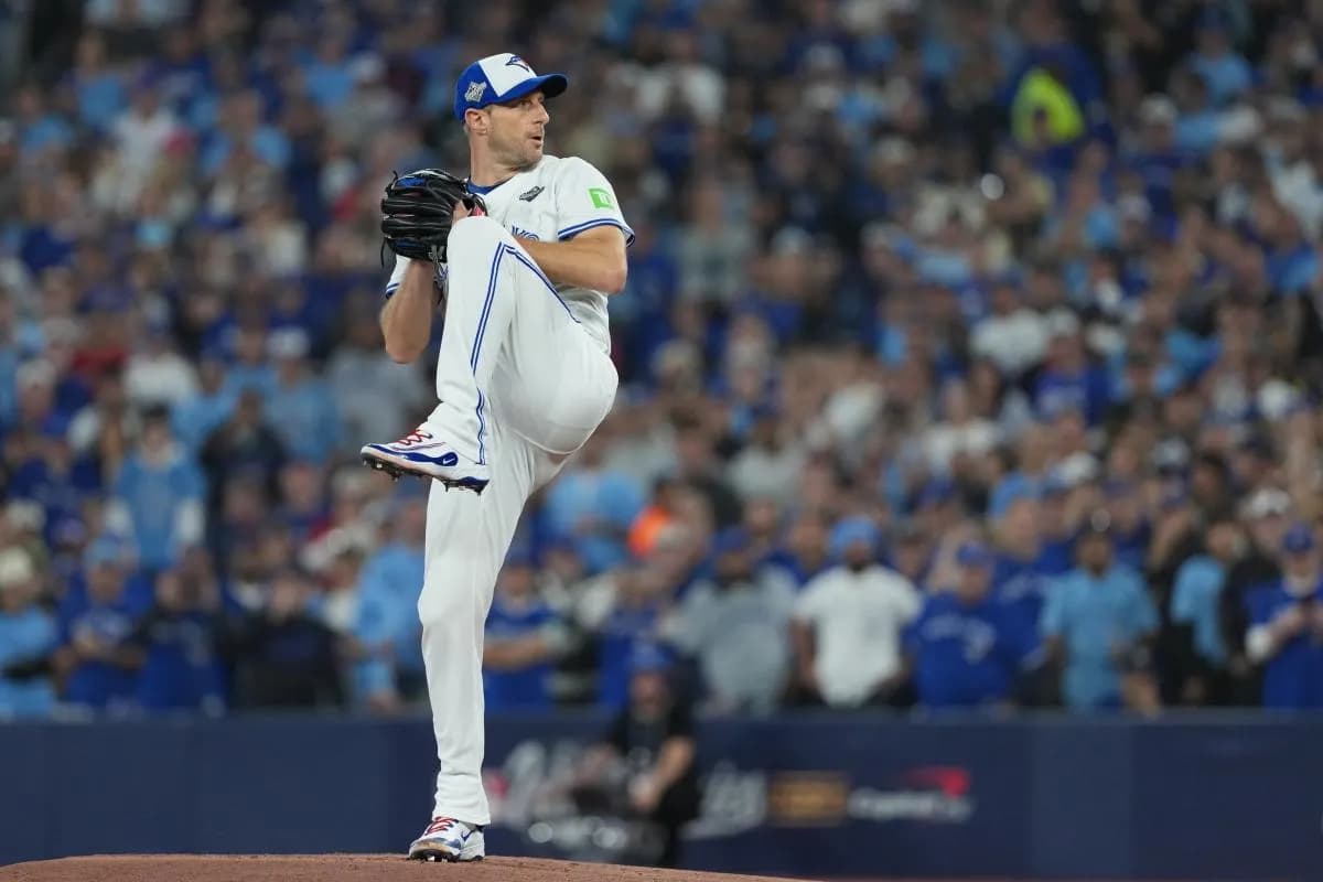 Toronto Blue Jays pitcher Max Scherzer (31) throws a pitch against the Los Angeles Dodgers in the first inning for game seven of the 2025 MLB World Series at Rogers Centre.