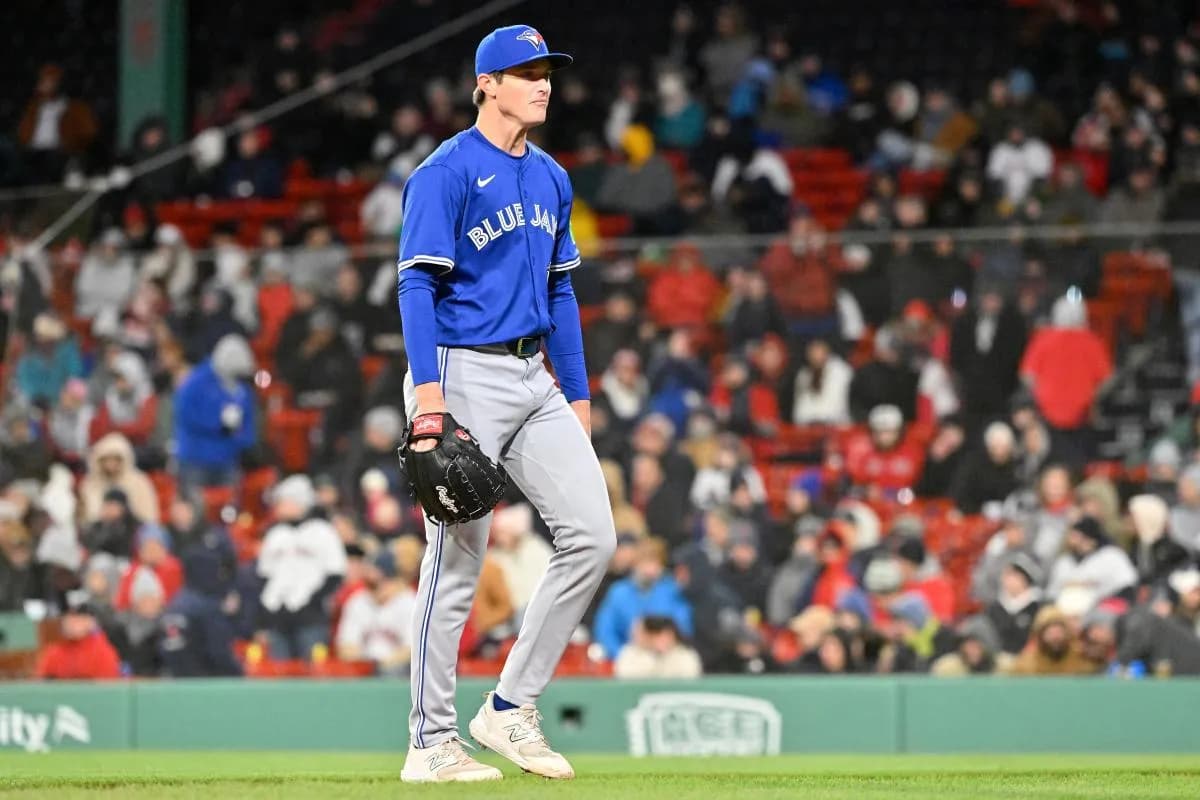 Toronto Blue Jays starting pitcher Easton Lucas (62) is relieved of the ball during the sixth inning against the Boston Red Sox at Fenway Park.