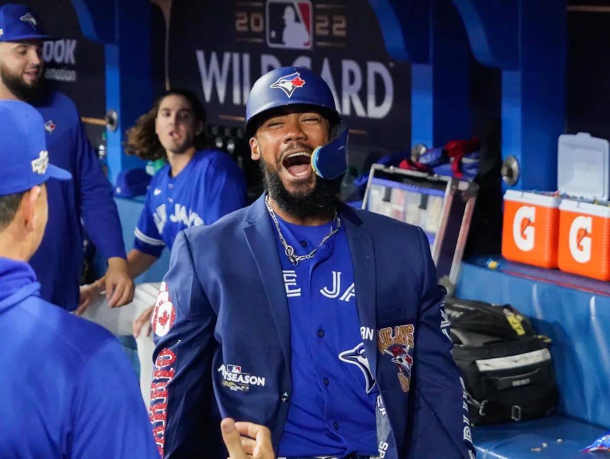 Toronto Blue Jays right fielder Teoscar Hernandez (37) celebrates in the dugout after hitting a solo home run in the fourth inning against the Seattle Mariners during game two of the Wild Card series for the 2022 MLB Playoffs at Rogers Centre.