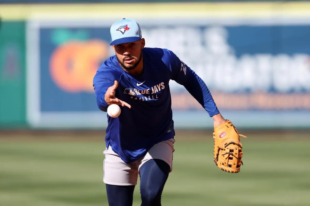 Toronto Blue Jays designated hitter Anthony Santander (25) tosses a ball before the game against the Los Angeles Angels at Angel Stadium.