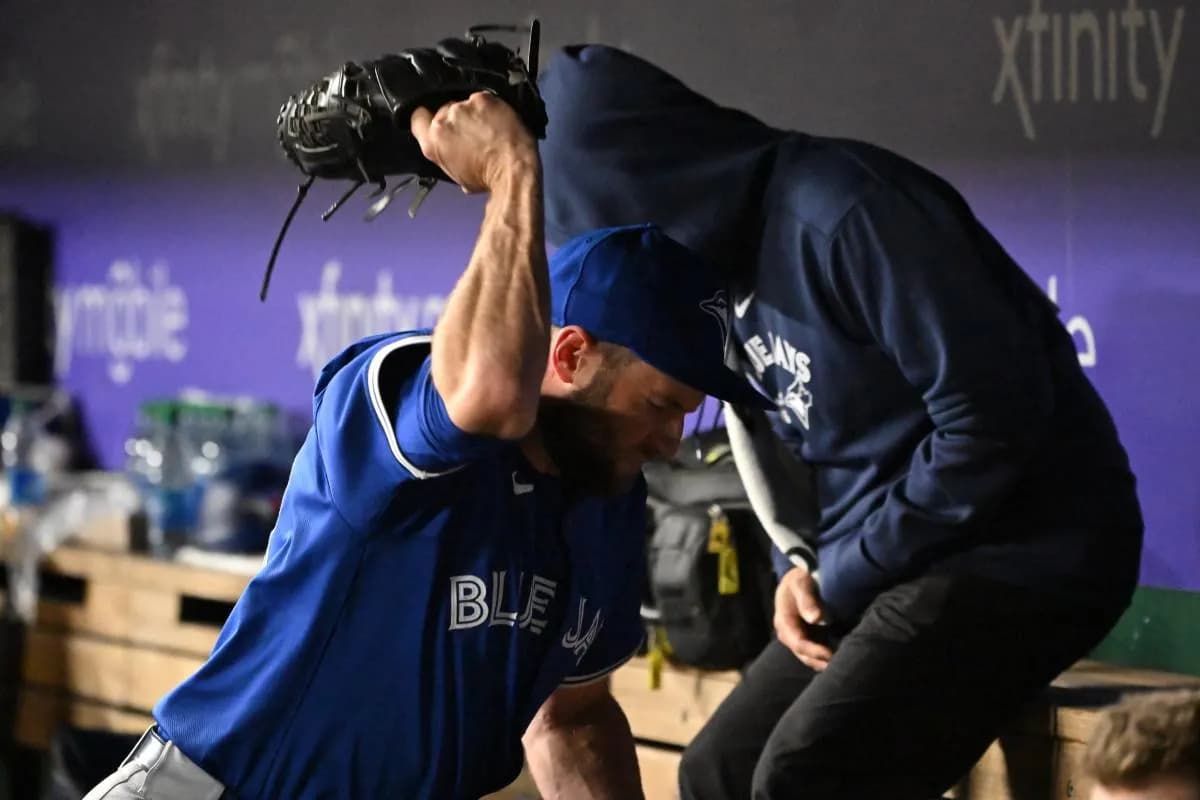 Toronto Blue Jays relief pitcher Tim Mayza (58) reacts in the dugout after giving up 2 runs against the Washington Nationals during the seventh inning at Nationals Park.