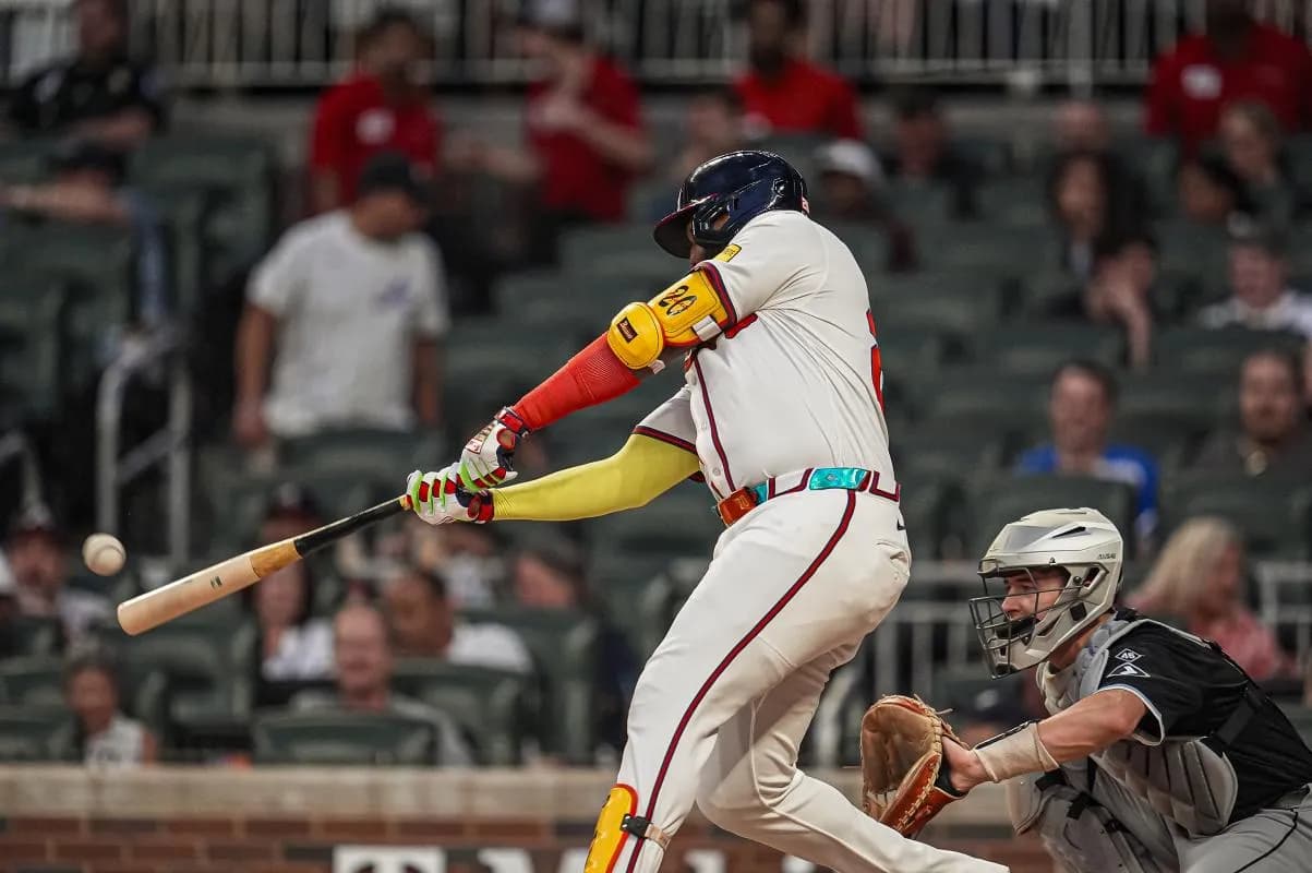 Atlanta Braves designated hitter Marcell Ozuna (20) hits a double against the Chicago White Sox during the fourth inning at Truist Park.