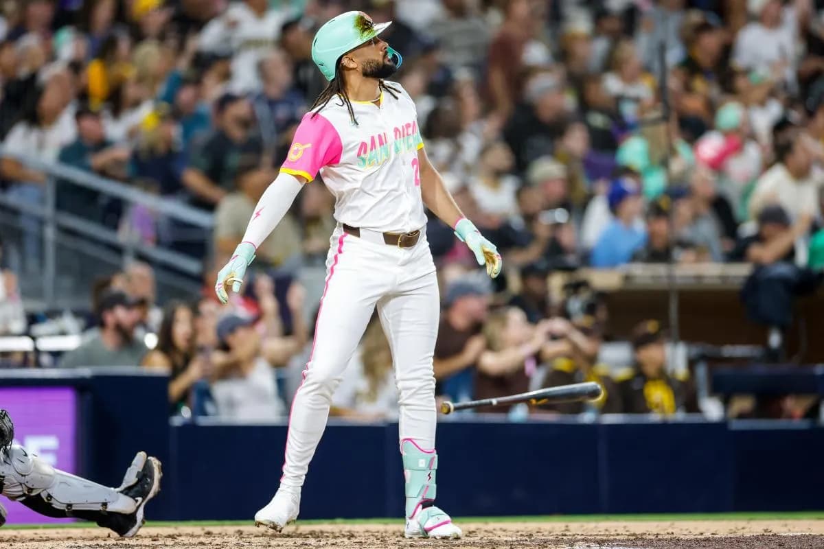 San Diego Padres right fielder Fernando Tatis Jr. (23) hits a grand slam home run during the fourth inning Arizona Diamondbacks at Petco Park.