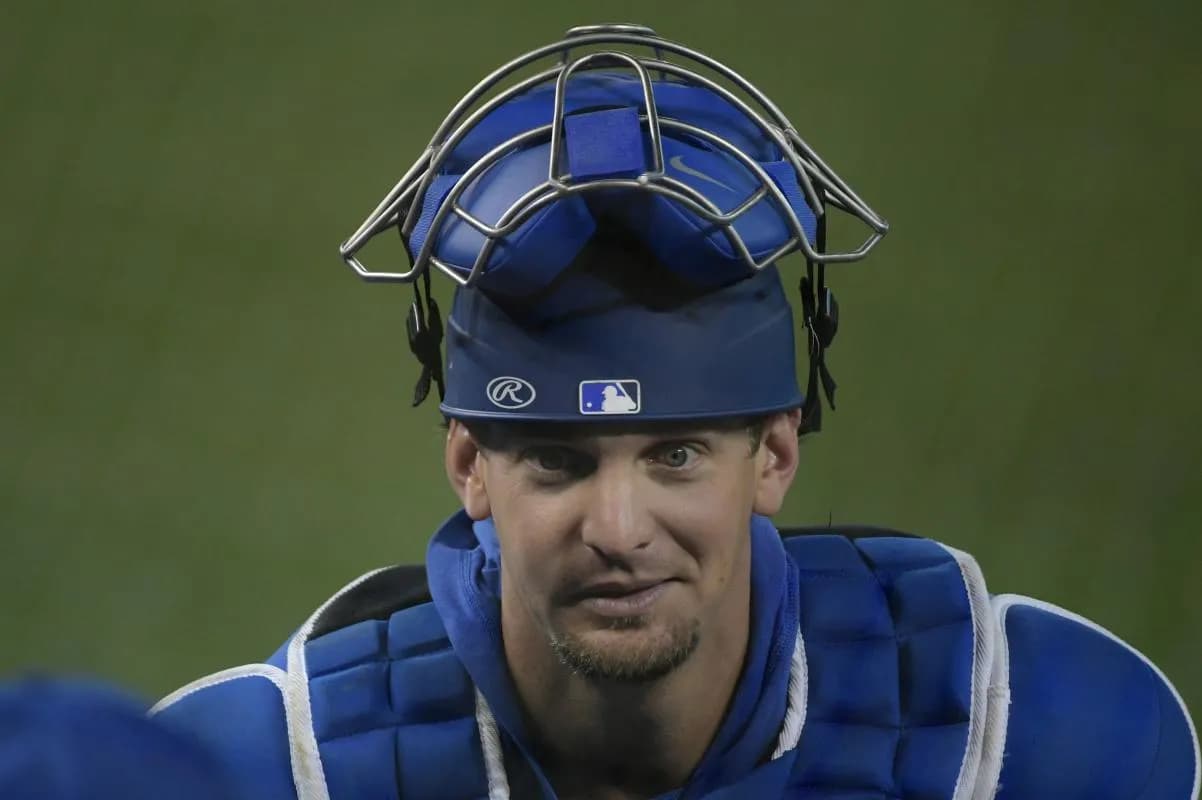 Toronto Blue Jays catcher Caleb Joseph (7) talks to a team mate during summer training camp batting practice at Rogers Centre.