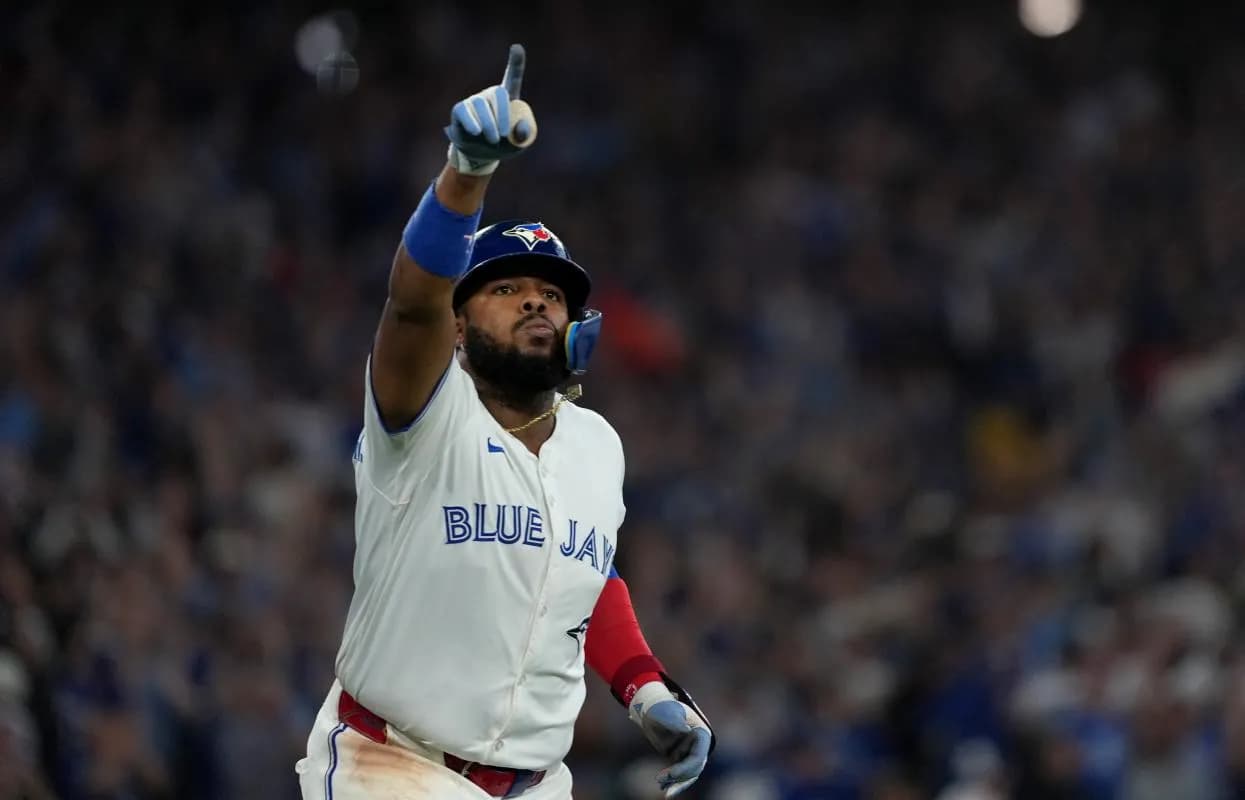 Toronto Blue Jays first baseman Vladimir Guerrero Jr. (27) celebrates after hitting a home run in the fifth inning against the Seattle Mariners during game six of the ALCS round for the 2025 MLB playoffs at Rogers Centre