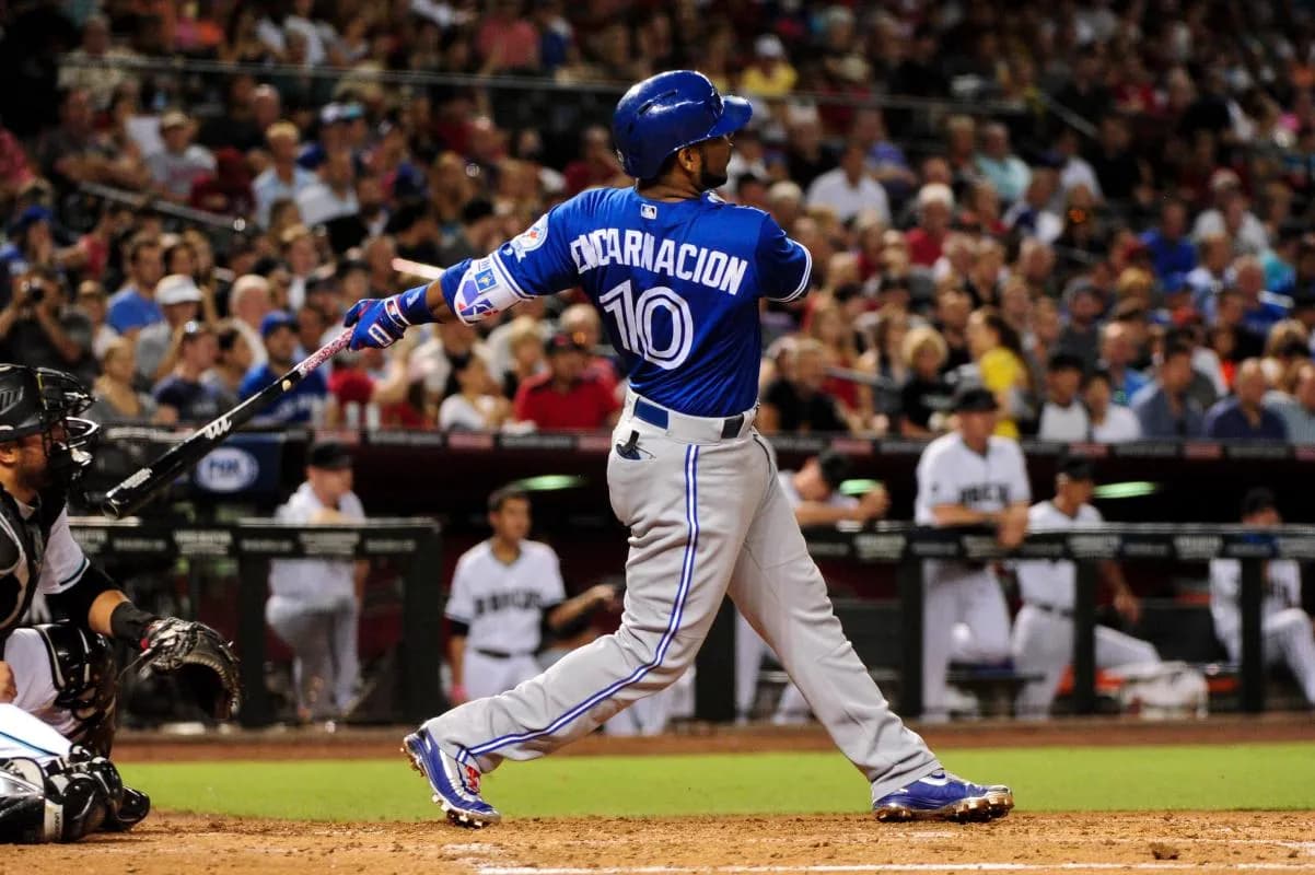 Toronto Blue Jays designated hitter Edwin Encarnacion (10) hits a three run home run against the Arizona Diamondbacks in the third inning at Chase Field.