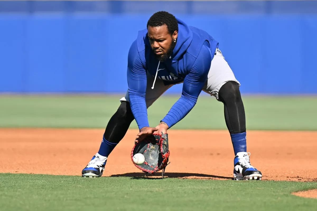 Toronto Blue Jays infielder Vladimir Guerrero Jr. (27) fields a ground ball during spring training at the Bobby Mattick Training Center at Englebert Complex.
