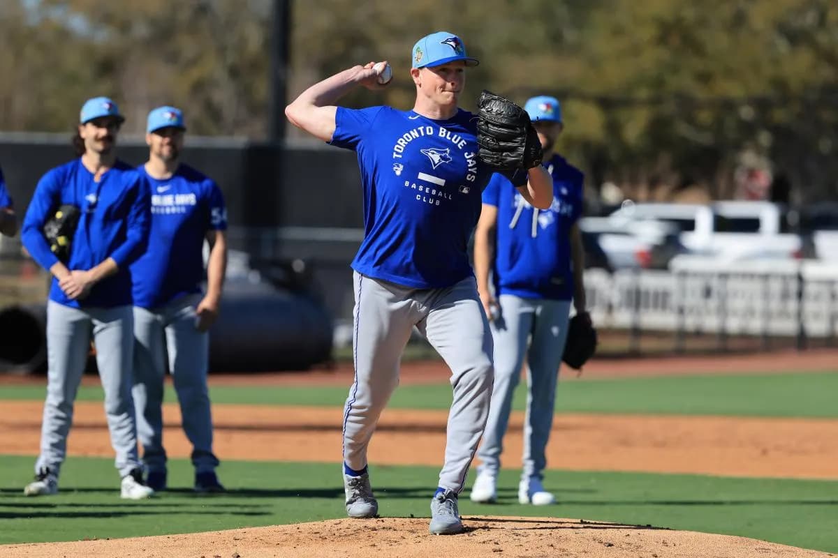 Toronto Blue Jays pitcher Louis Varland (77) works out during spring training practice at Player Development Complex.