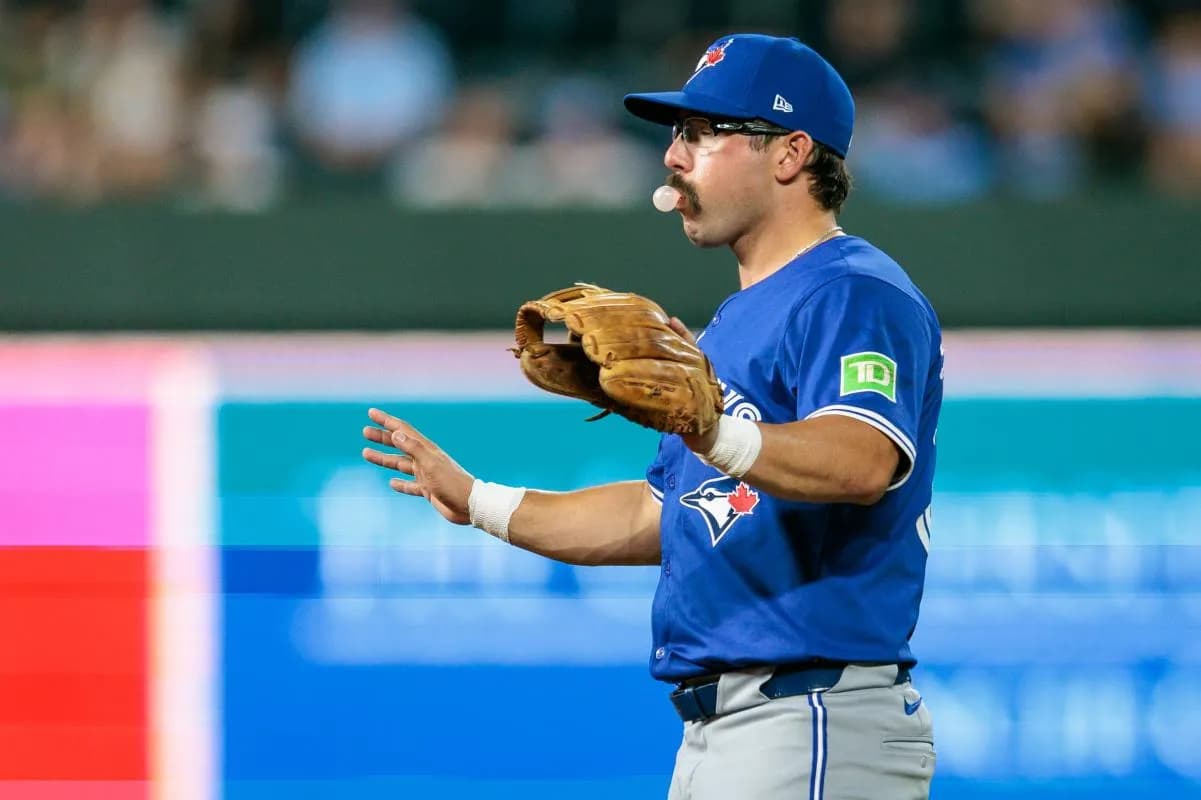Toronto Blue Jays outfielder Davis Schneider (36) on the field during the sixth inning against the Kansas City Royals at Kauffman Stadium.