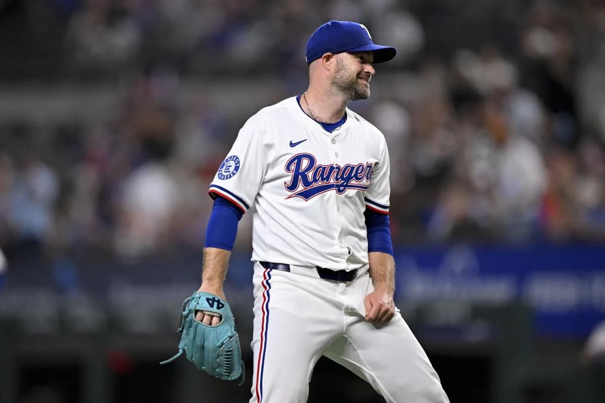 Texas Rangers relief pitcher Danny Coulombe (54) celebrates after he pitches against the New York Yankees during the tenth inning at Globe Life Field.