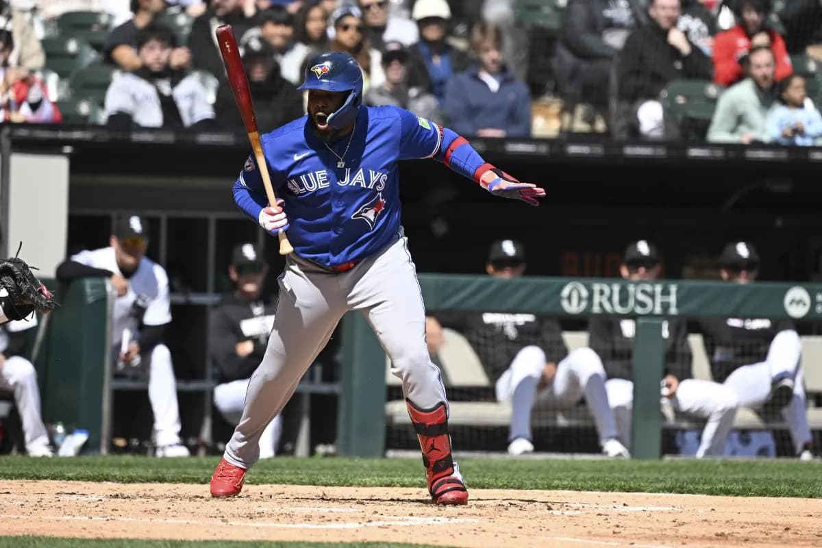 Toronto Blue Jays first baseman Vladimir Guerrero Jr. (27) reacts after he was walked to load the bases during the third inning against the Chicago White Sox at Rate Field