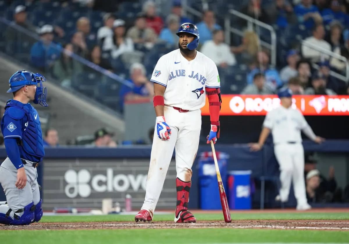 Toronto Blue Jays first baseman Vladimir Guerrero Jr. (27) reacts to a third strike call against the Los Angeles Dodgers during the eighth inning at Rogers Centre.