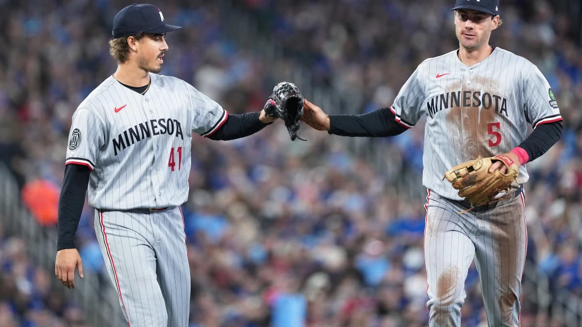 Minnesota Twins starting starting pitcher Joe Ryan (41) celebrates the final out with third baseman Ryan Kreidler (5) against the Toronto Blue Jays during he seventh inning at Rogers Centre.