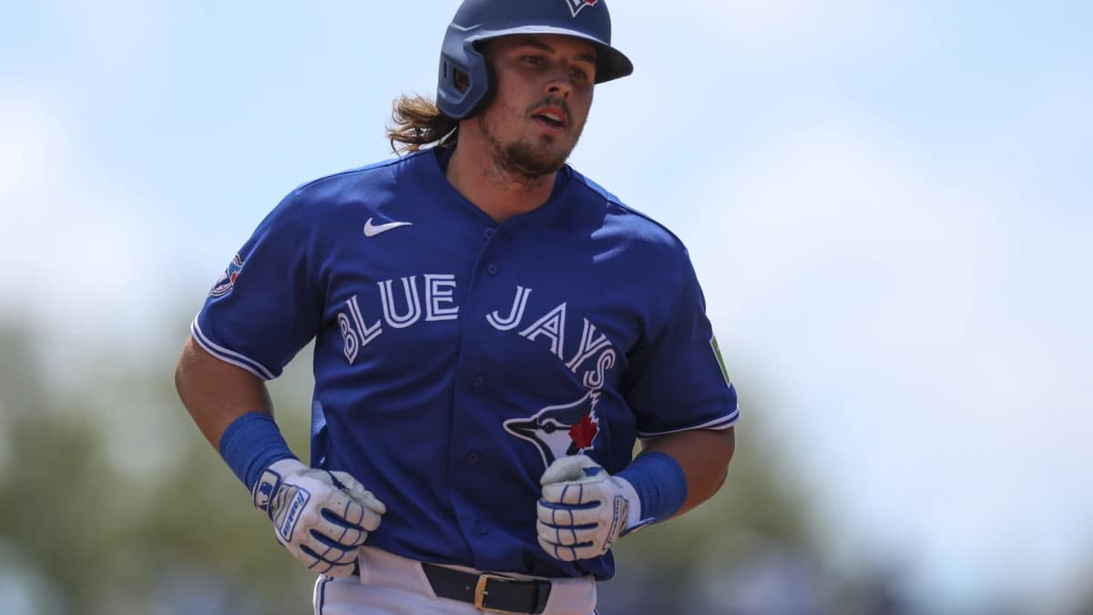 Toronto Blue Jays third baseman Addison Barger (47) runs the bases after hitting a solo home run against the Detroit Tigers in the second inning during spring training at TD Ballpark.