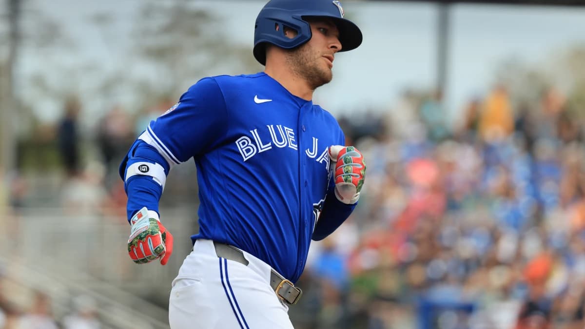 Toronto Blue Jays center fielder Daulton Varsho (5) hits a home run during the fifth inning against the Detroit Tigers at TD Ballpark.