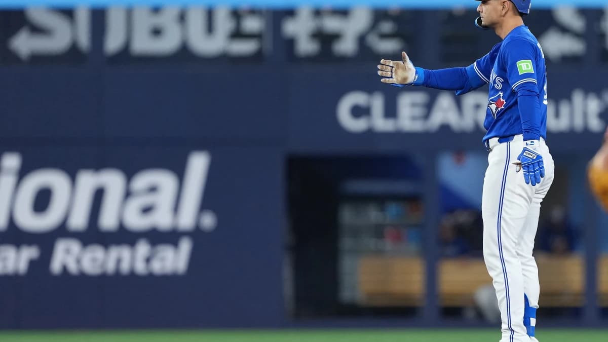 Toronto Blue Jays second baseman Andres Gimenez (0) celebrates hitting a two run double against the Cleveland Guardians during the sixth inning at Rogers Centre.