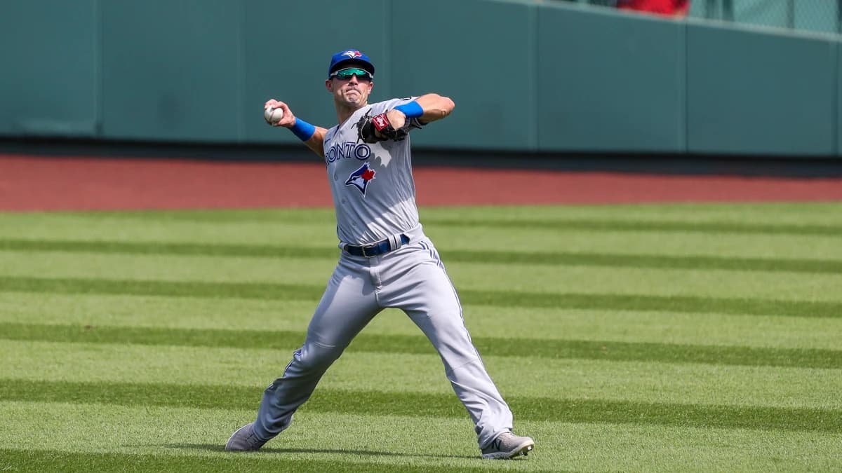 Toronto Blue Jays center fielder Randal Grichuk (15) throws home during the third inning against the Boston Red Sox at Fenway Park.