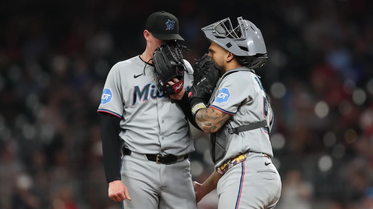 Miami Marlins pitcher Pete Fairbanks (29) and Miami Marlins catcher Agustin Ramirez (50) meet on the mound against the Atlanta Braves in the eight inning at Truist Park.