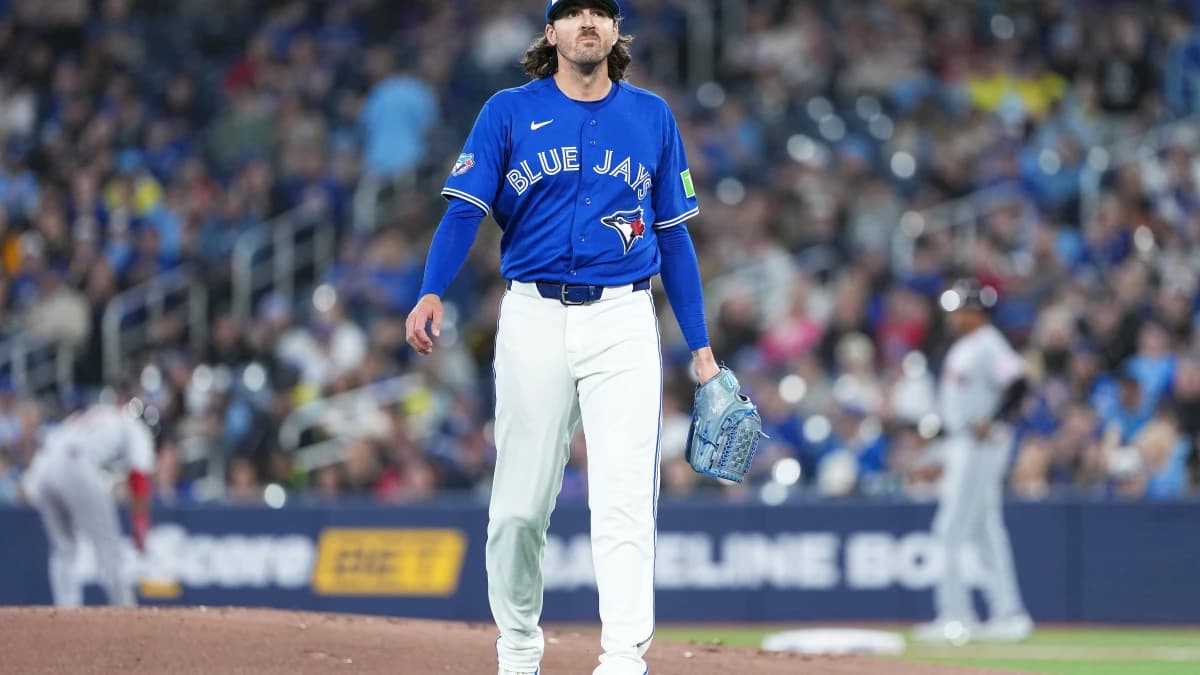 Toronto Blue Jays starting pitcher Kevin Gausman (34) walks towards the dugout against the Cleveland Guardians during the first inning at Rogers Centre.