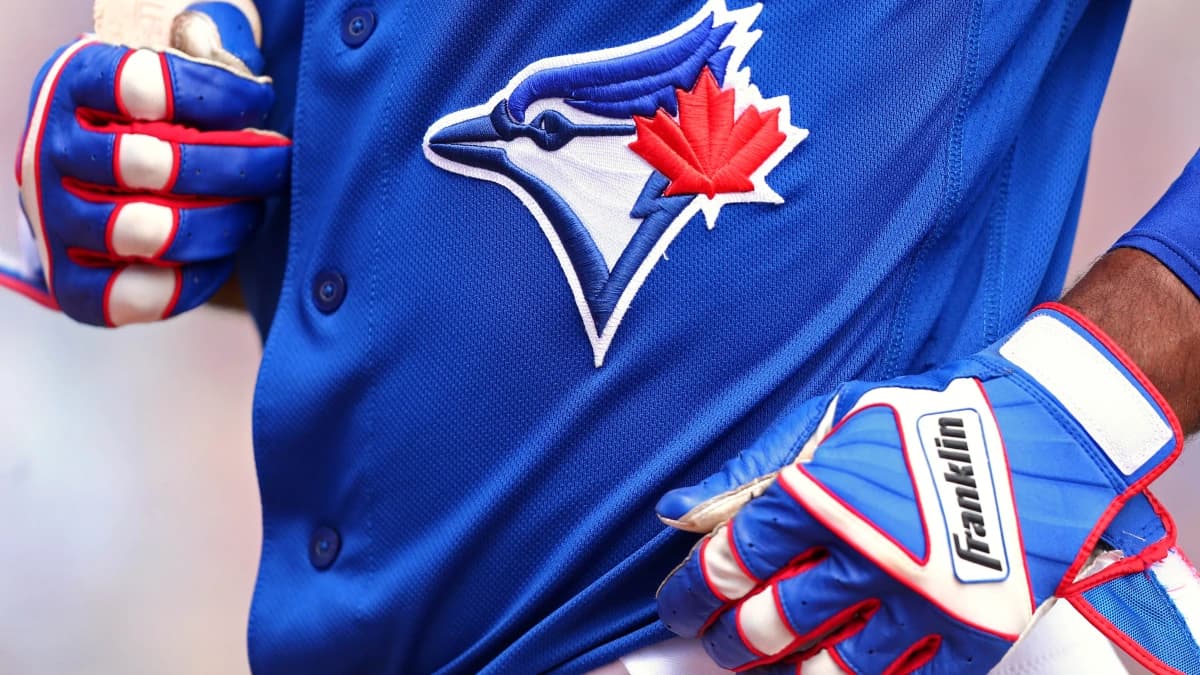 A view of the Blue Jays logo on an official Majestic game jersey during a game between the Pittsburgh Pirates and the Toronto Blue Jays at Florida Auto Exchange Stadium