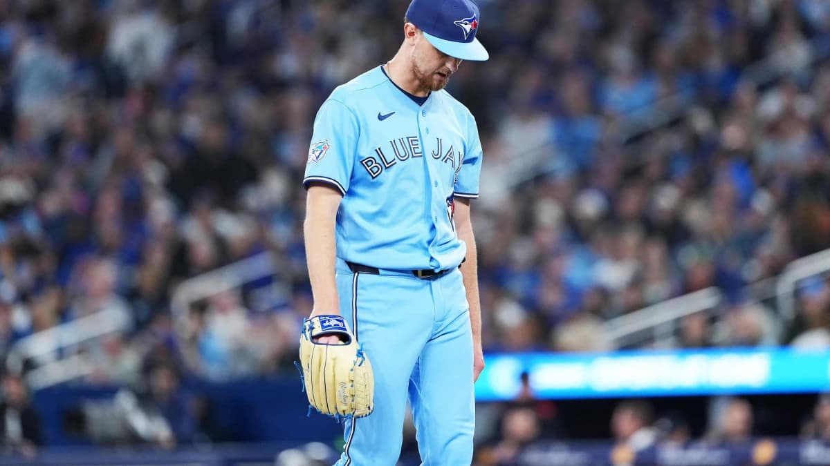 Toronto Blue Jays starting pitcher Eric Lauer (56) walks towards the dugout against the Minnesota Twins during the third inning at Rogers Centre.