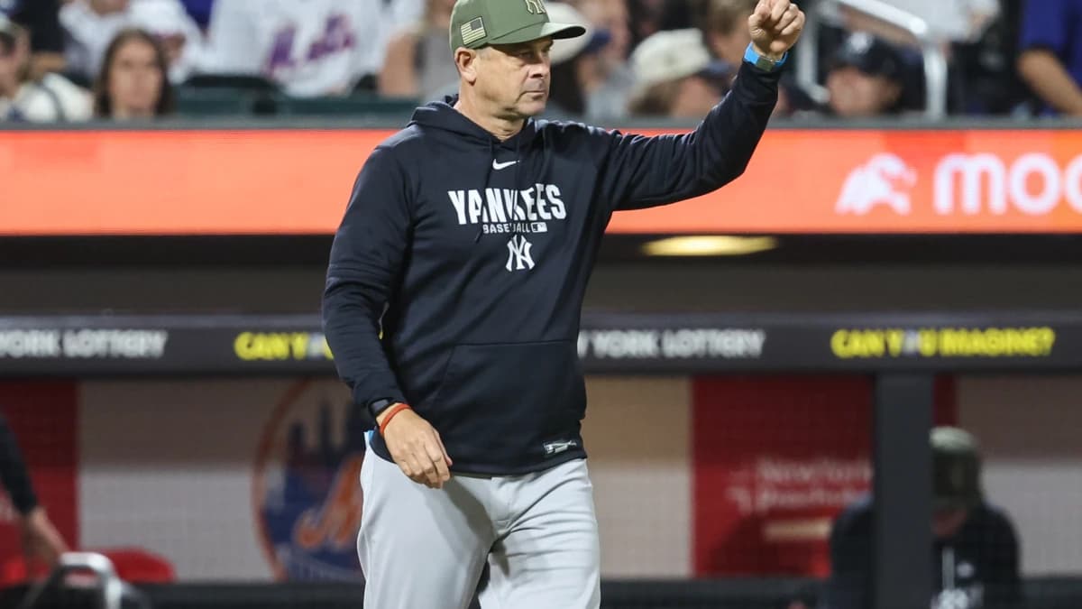 New York Yankees manager Aaron Boone (17) signals for a pitching change in the fifth inning against the New York Mets at Citi Field.