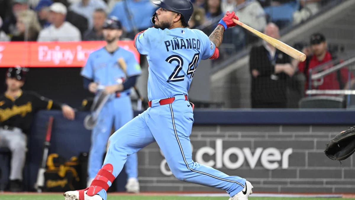 Toronto Blue Jays left fielder Yohendrick Pinango (24) hits a single against the Pittsburgh Pirates in the sixth inning at Rogers Centre.