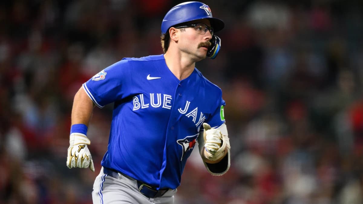 Toronto Blue Jays left fielder Davis Schneider (36) runs during the fifth inning against the Los Angeles Angels at Angel Stadium.