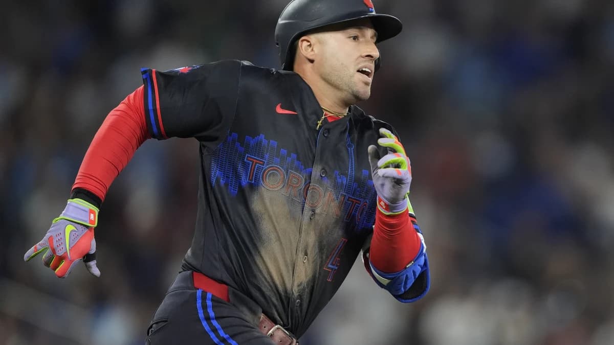 Toronto Blue Jays designated hitter George Springer (4) runs to first base on an RBI double against the Pittsburgh Pirates during the eighth inning at Rogers Centre