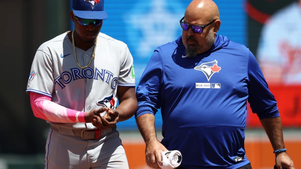 Toronto Blue Jays right fielder Jesus Sanchez (12) gets injured during the sixth inning against the Baltimore Orioles at Oriole Park at Camden Yards.