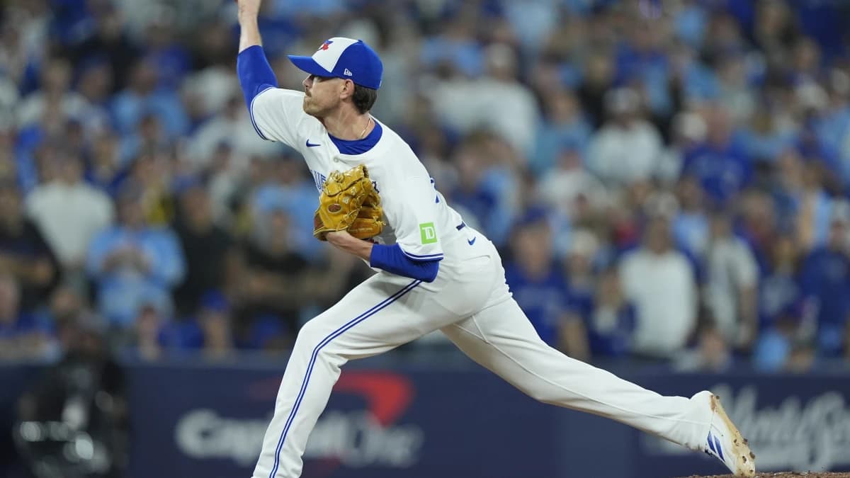 Toronto Blue Jays pitcher Shane Bieber (57) pitches against the Los Angeles Dodgers in the eleventh inning during game seven of the 2025 MLB World Series at Rogers Centre.