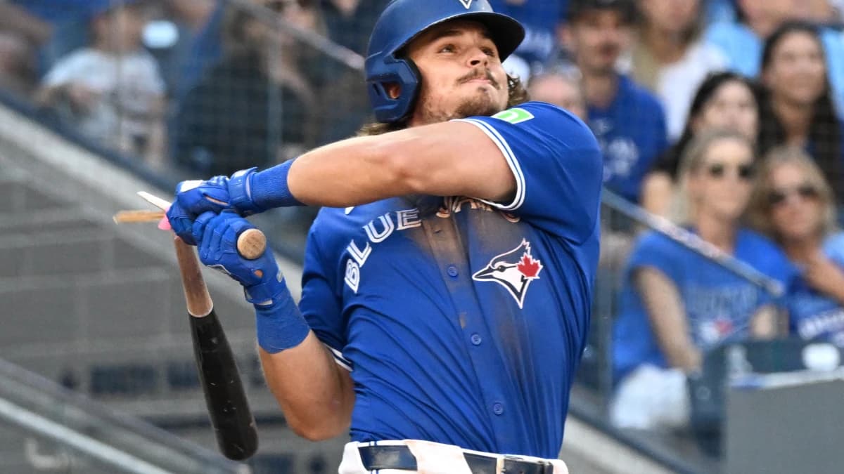 Toronto Blue Jays third baseman Addison Barger (47) breaks his bat as he hits a double against the Tampa Bay Rays in the fifth inning at Rogers Centre.