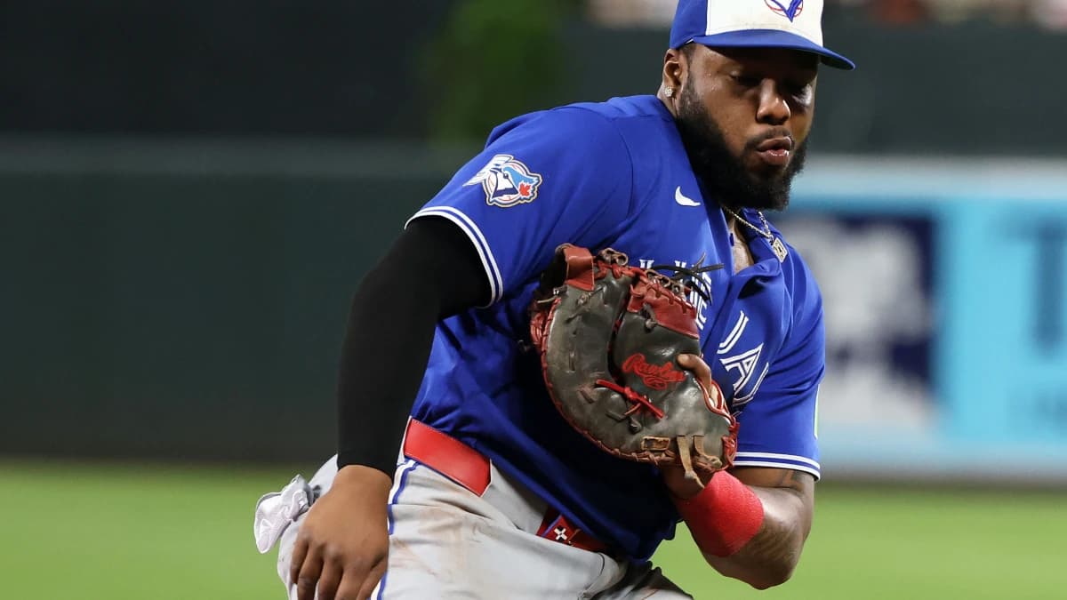 Toronto Blue Jays first baseman Vladimir Guerrero Jr. (27) makes a catch for an out during the sixth inning against the Baltimore Orioles at Oriole Park at Camden Yards.