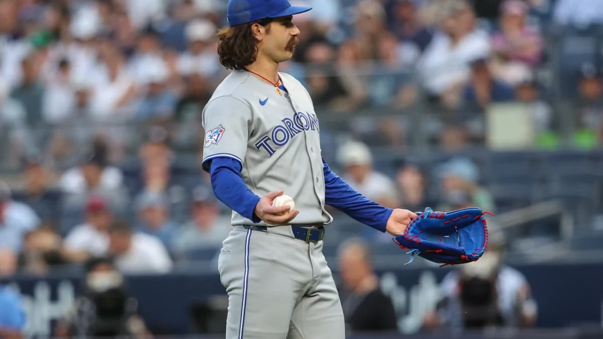Toronto Blue Jays starting pitcher Dylan Cease (84) gestures to home plate after a pitch in the first inning against the New York Yankees at Yankee Stadium.