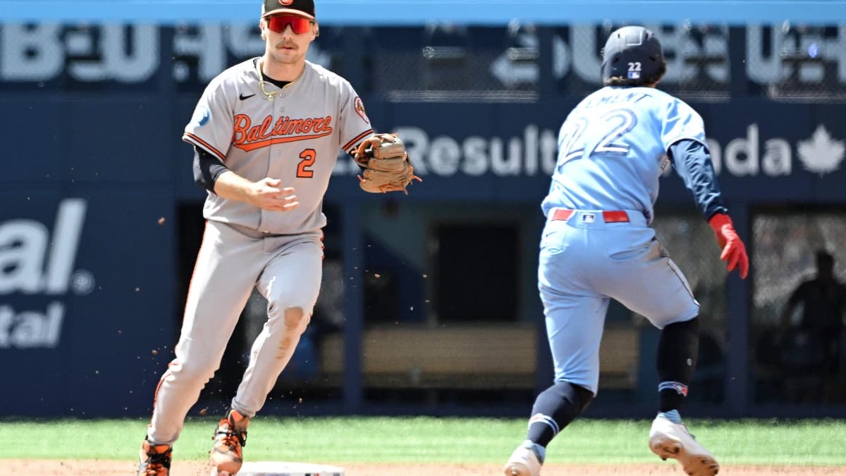 Baltimore Orioles shortstop Gunnar Henderson (2) misses a tag on Toronto Blue Jays second baseman Ernie Clement (22) for a fielding error in the sixth inning at Rogers Centre.